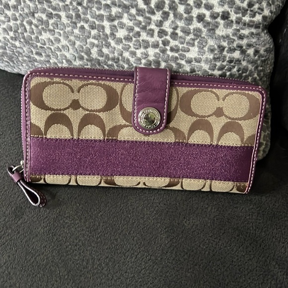 Coach Handbags - Ladies COACH Signature Logo Purple Stripe Zip Around Wallet with Snap Closure